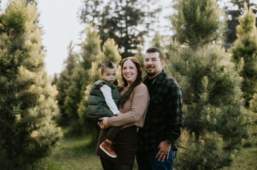 Pictured is Rolando, his wife Stephanie, and grumpy son Ronan.